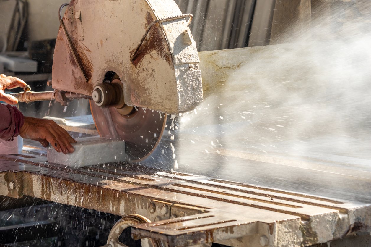 Worker Cutting Marble